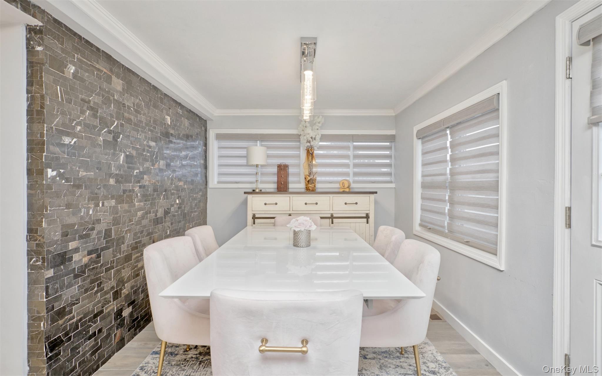 383 White Road Mineola, NY 11501 - Photo 8 of 21 a view of a dining room with furniture and wooden floor