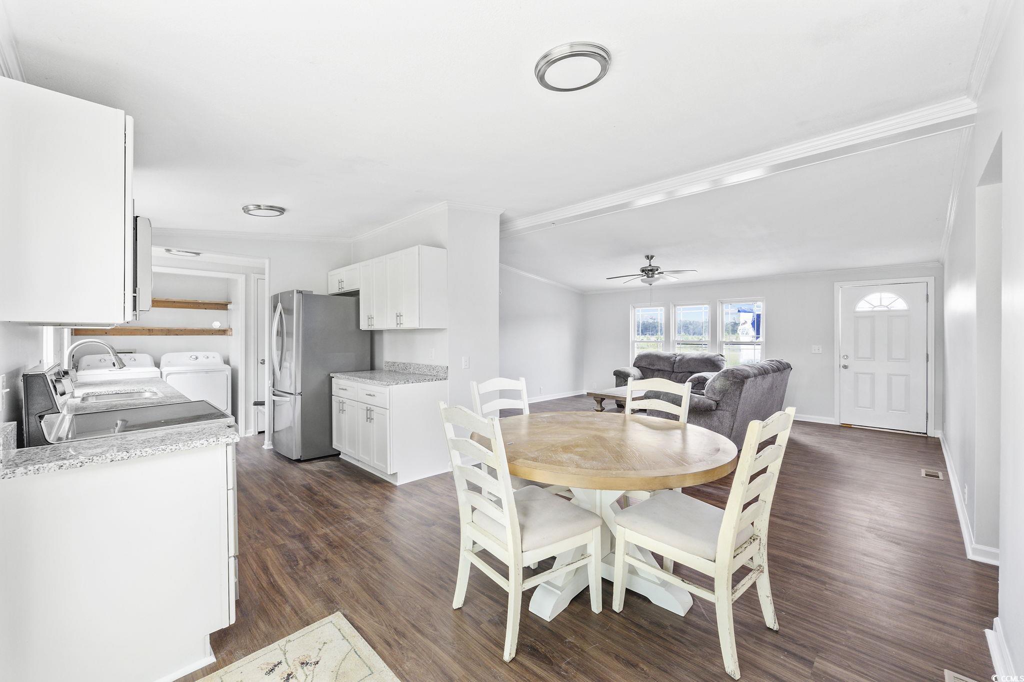 301 Duck Cove Road Conway, SC 29526 - Photo 11 of 25 Kitchen featuring stainless steel fridge, dark har