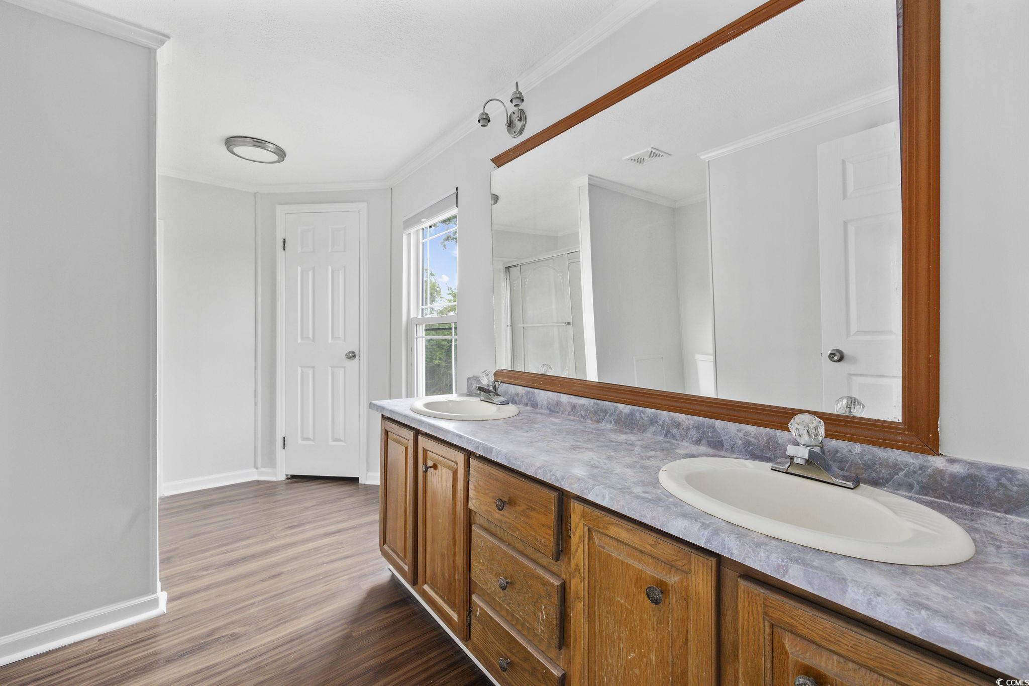 301 Duck Cove Road Conway, SC 29526 - Photo 18 of 25 Bedroom with ceiling fan, dark hardwood / wood-sty