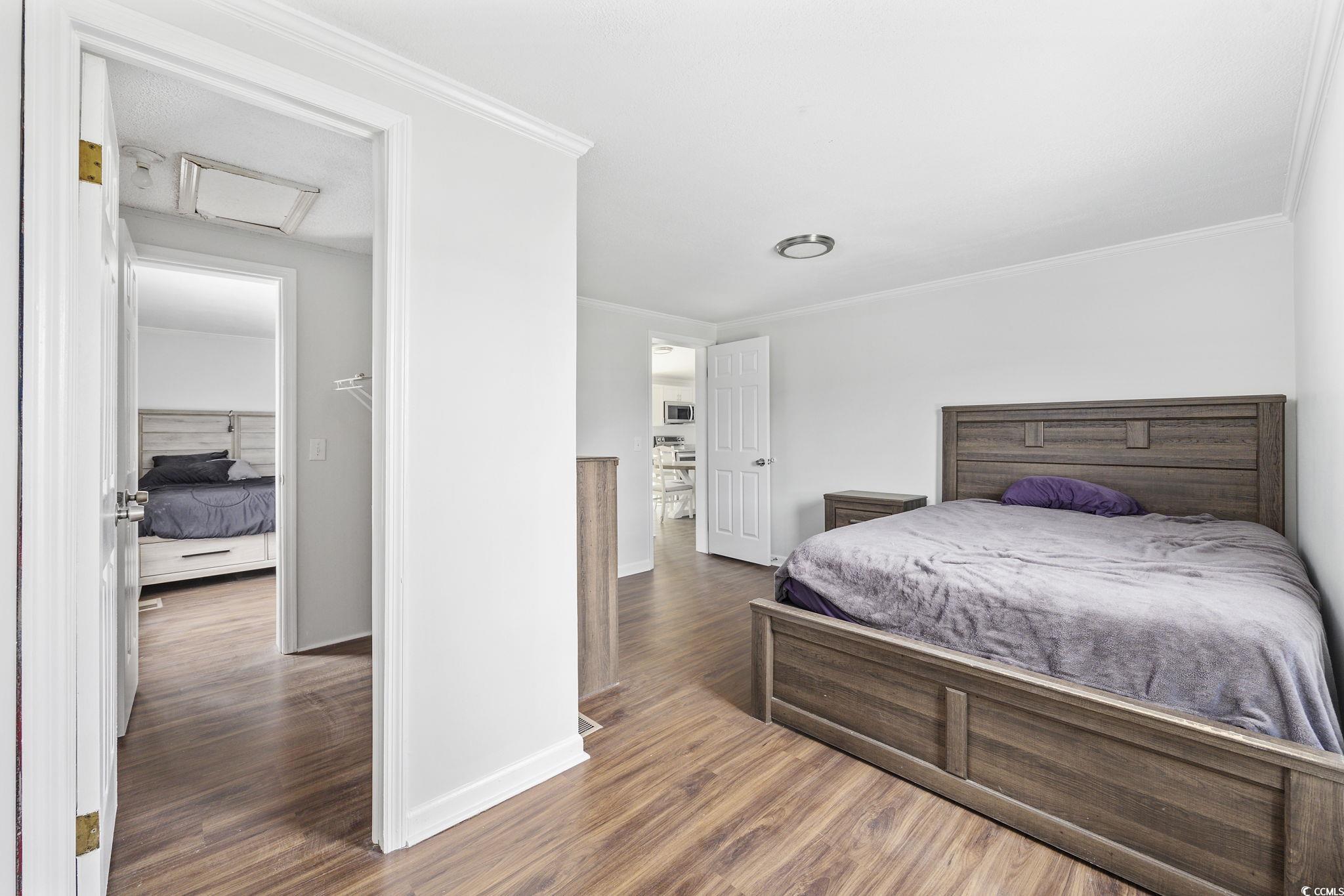 301 Duck Cove Road Conway, SC 29526 - Photo 21 of 25 Bathroom with vanity, ornamental molding, an enclo