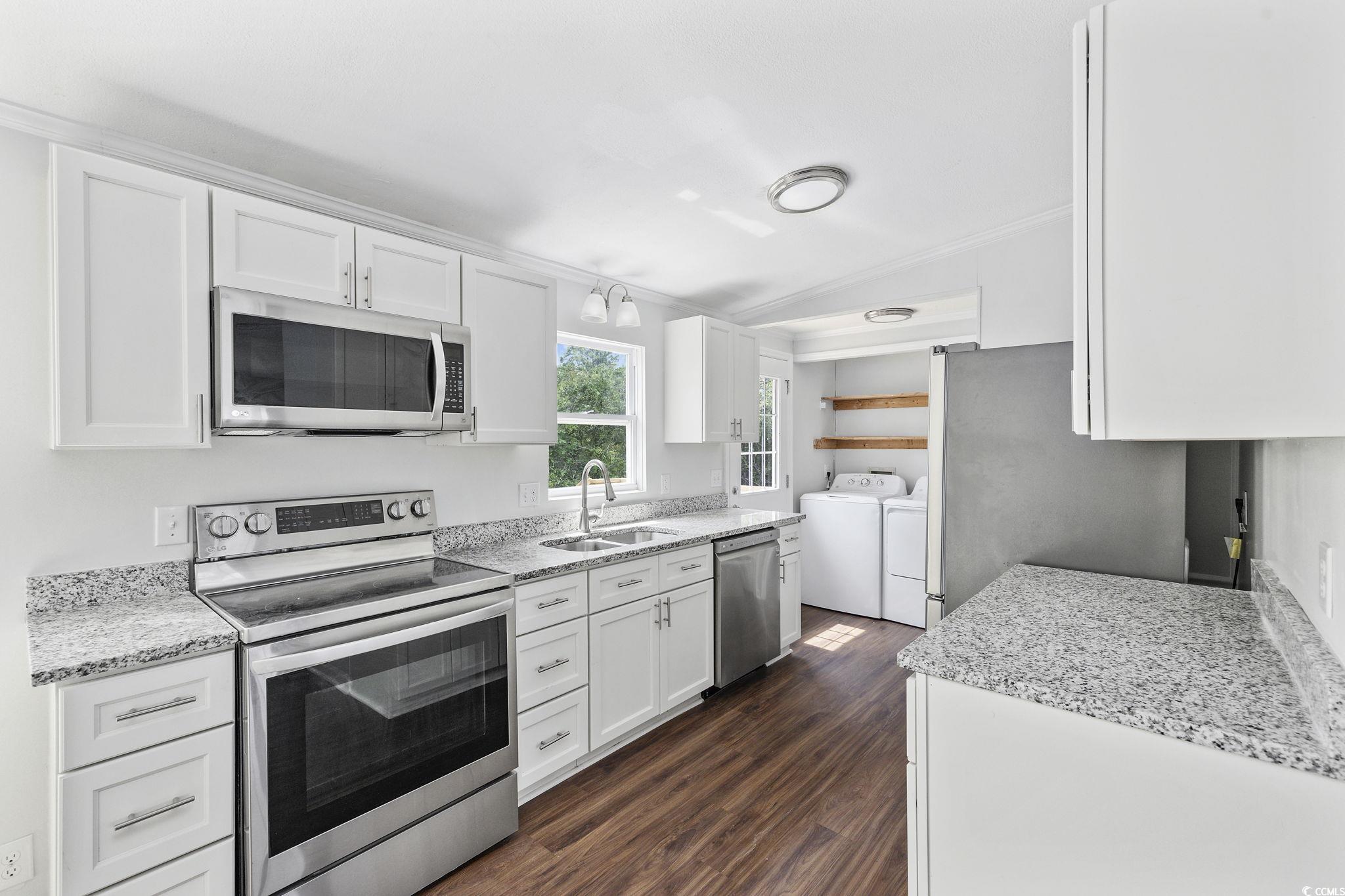 301 Duck Cove Road Conway, SC 29526 - Photo 7 of 25 Living room with a tiled fireplace, ornamental mol
