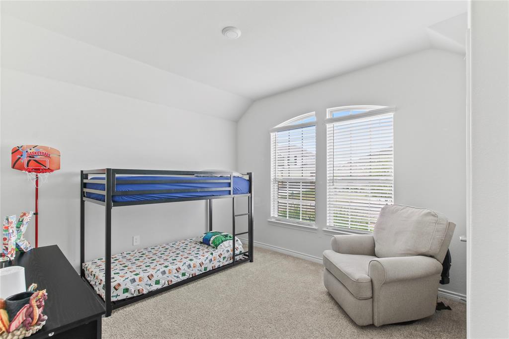 2920 Pinecrest Drive Aubrey, TX 76227 - Photo 16 of 27 a living room with furniture and a window