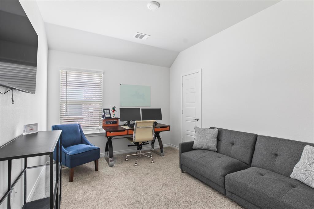 2920 Pinecrest Drive Aubrey, TX 76227 - Photo 18 of 27 a living room with furniture wooden floor and a window