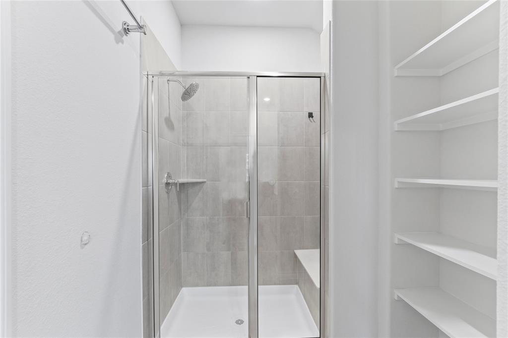 2920 Pinecrest Drive Aubrey, TX 76227 - Photo 22 of 27 a bathroom with a shower