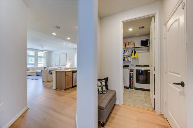 a view of a living room and bathroom