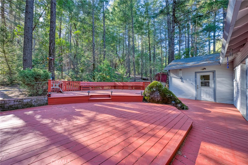 15885 Bottle Rock Road Middletown, CA 95461 - Photo 26 of 38 a backyard of a house with yard fire pit and outdoor seating