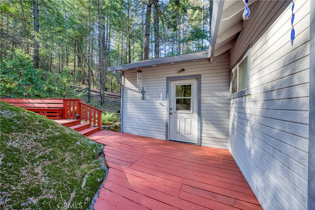 15885 Bottle Rock Road Middletown, CA 95461 - Photo 33 of 38 a front view of a house with a yard