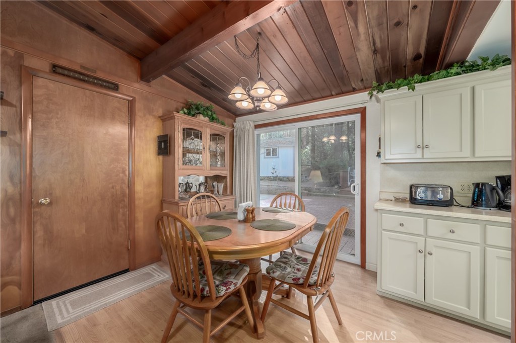 15885 Bottle Rock Road Middletown, CA 95461 - Photo 10 of 38 a view of a dining room with furniture window and outside view