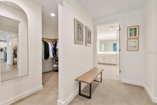 a view of a livingroom with furniture and front door