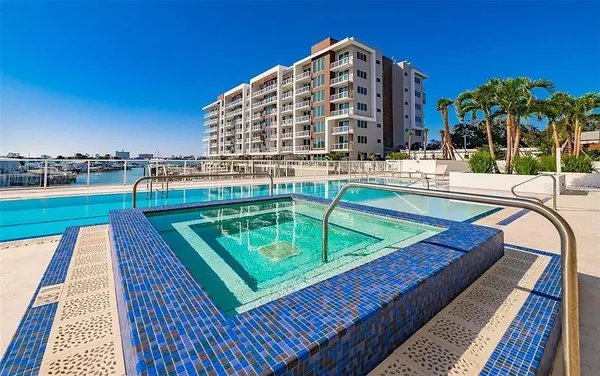 a view of a swimming pool with a terrace