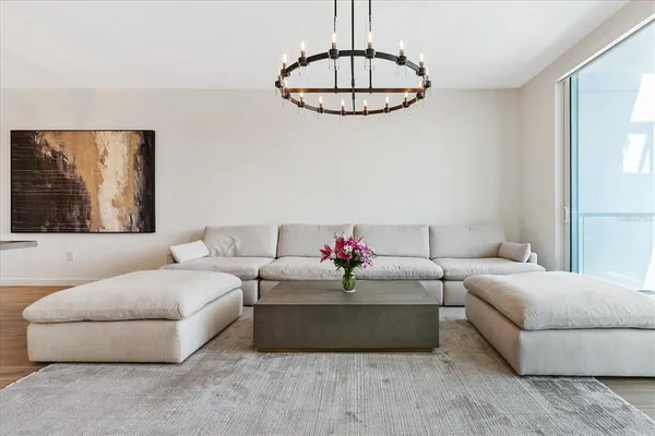 a living room with furniture and a window