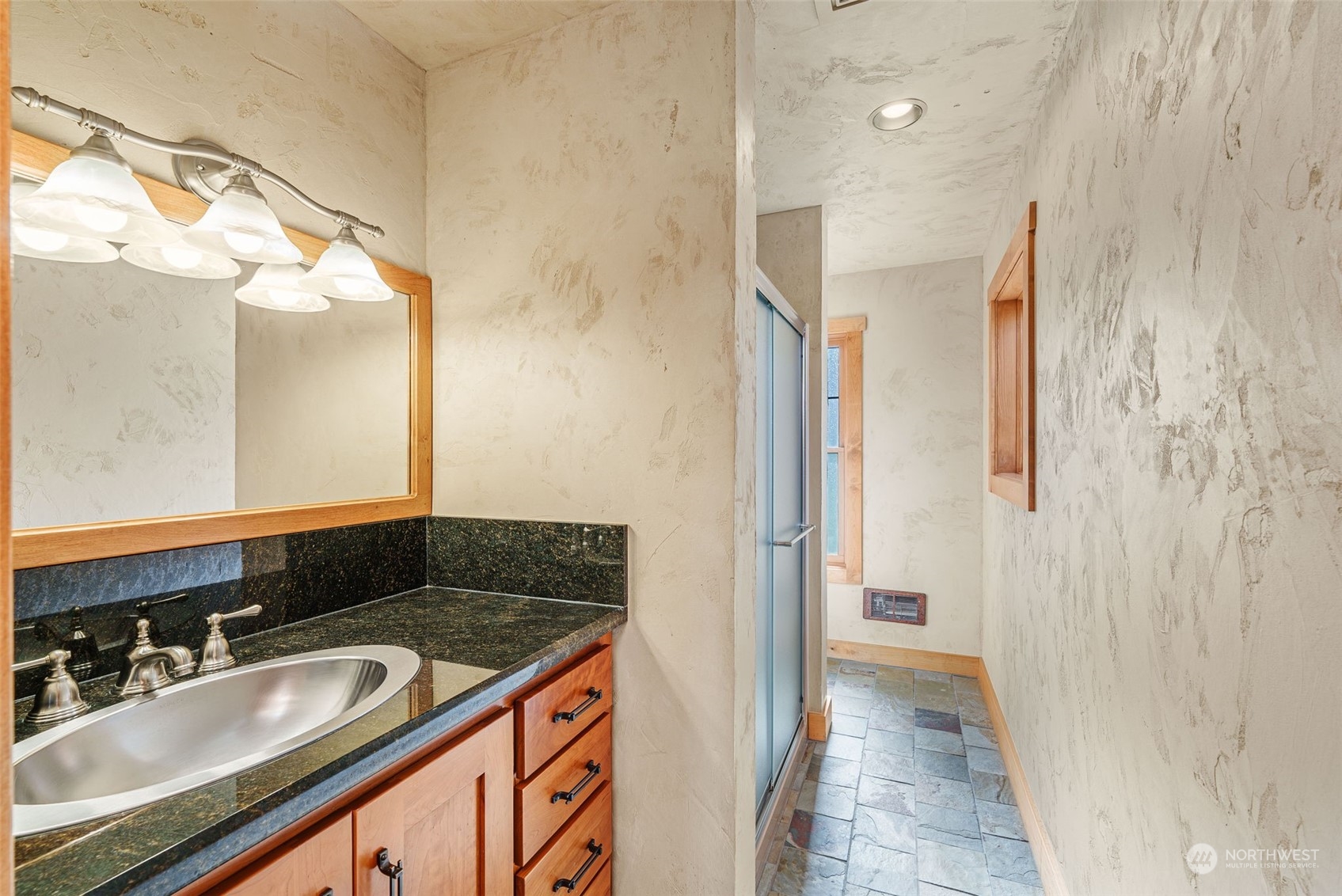 2325 Cays Road Sequim, WA 98382 - Photo 20 of 36 a bathroom with a granite countertop sink and a mirror