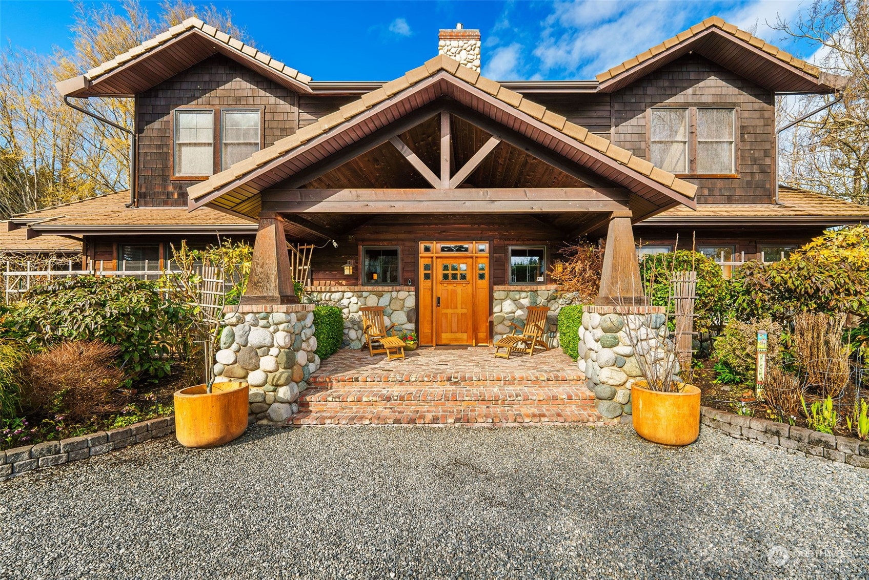 2325 Cays Road Sequim, WA 98382 - Photo 2 of 36 a front view of a house with an outdoor seating