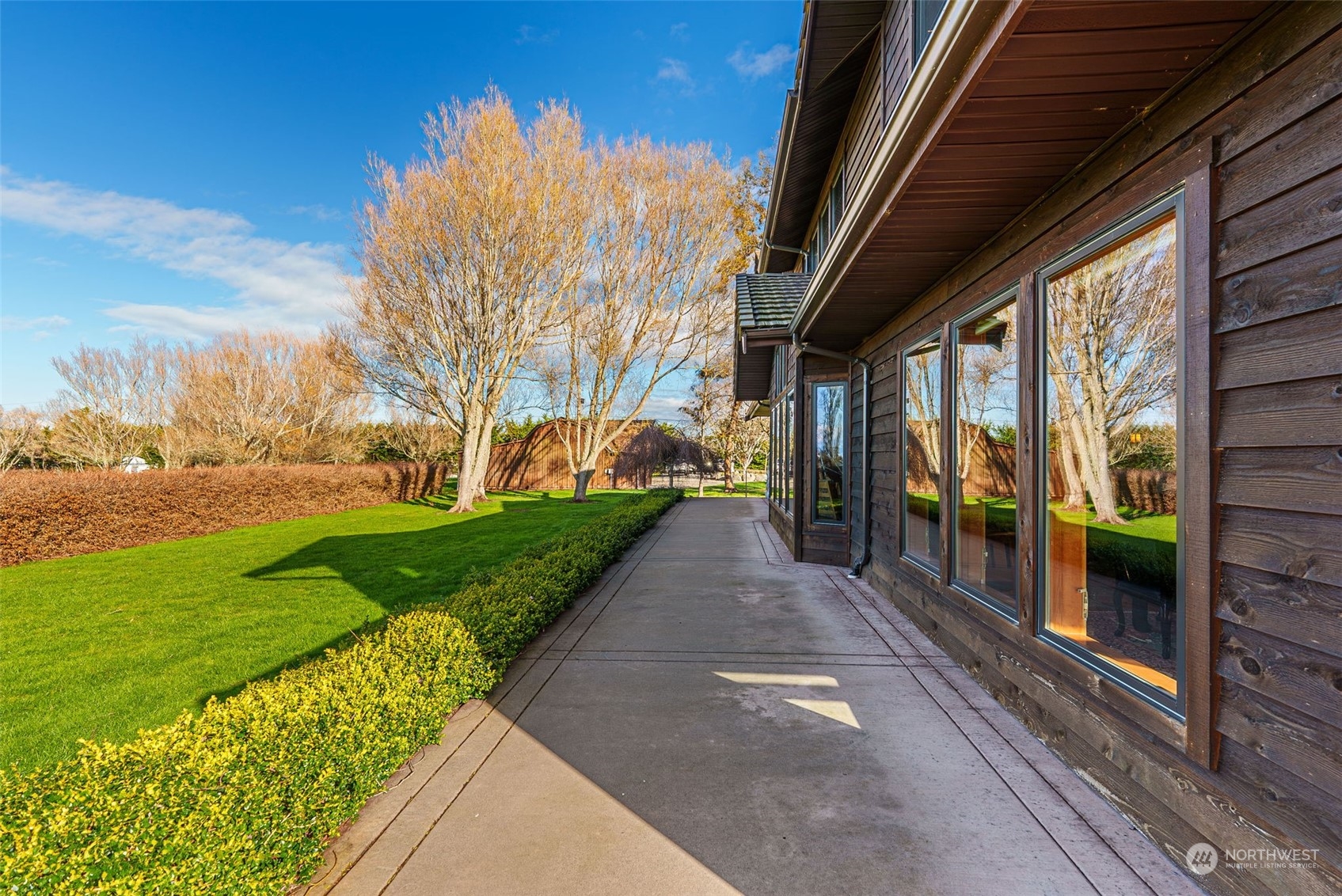 2325 Cays Road Sequim, WA 98382 - Photo 24 of 36 a view of a pathway with a garden