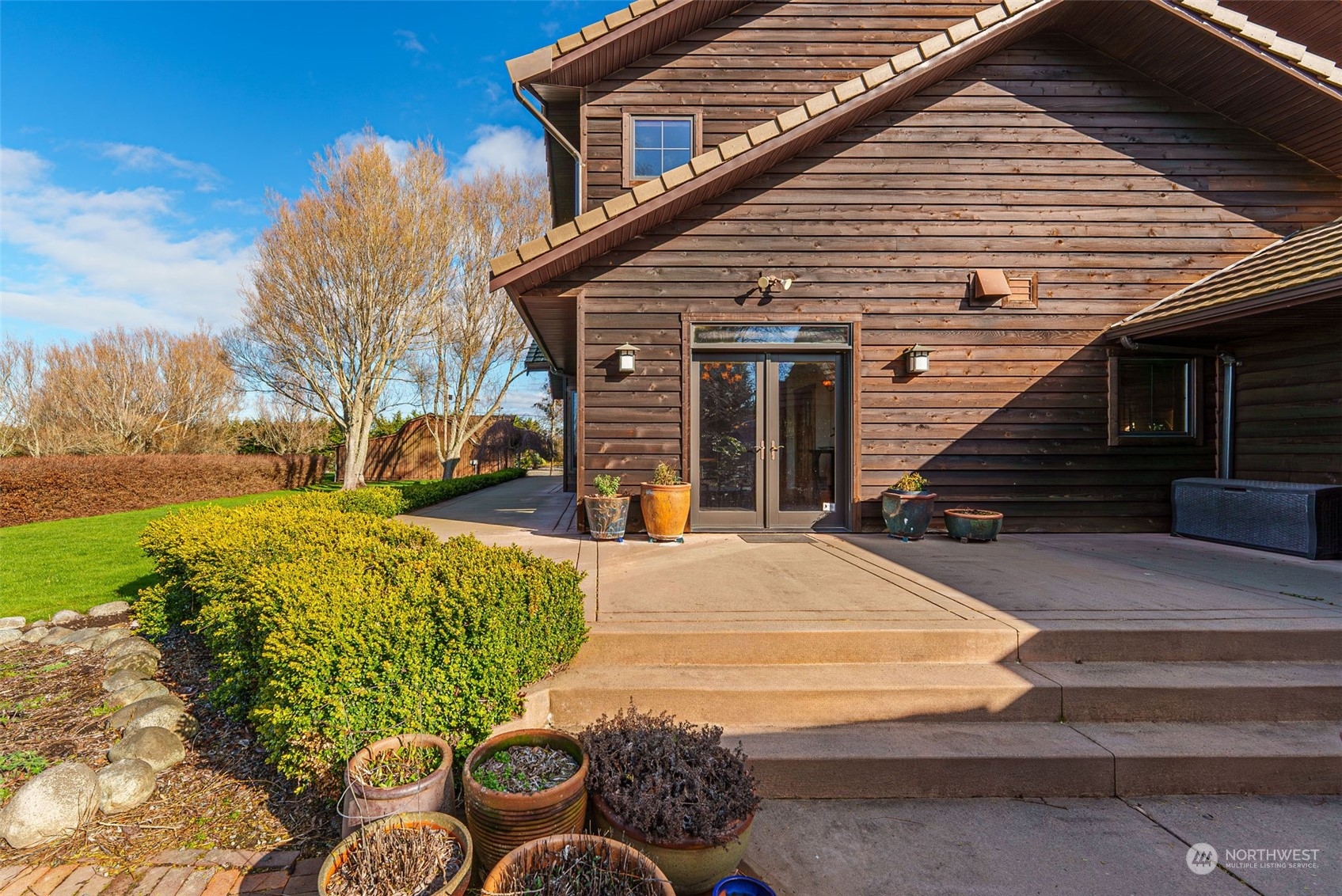 2325 Cays Road Sequim, WA 98382 - Photo 25 of 36 a front view of a house with a yard