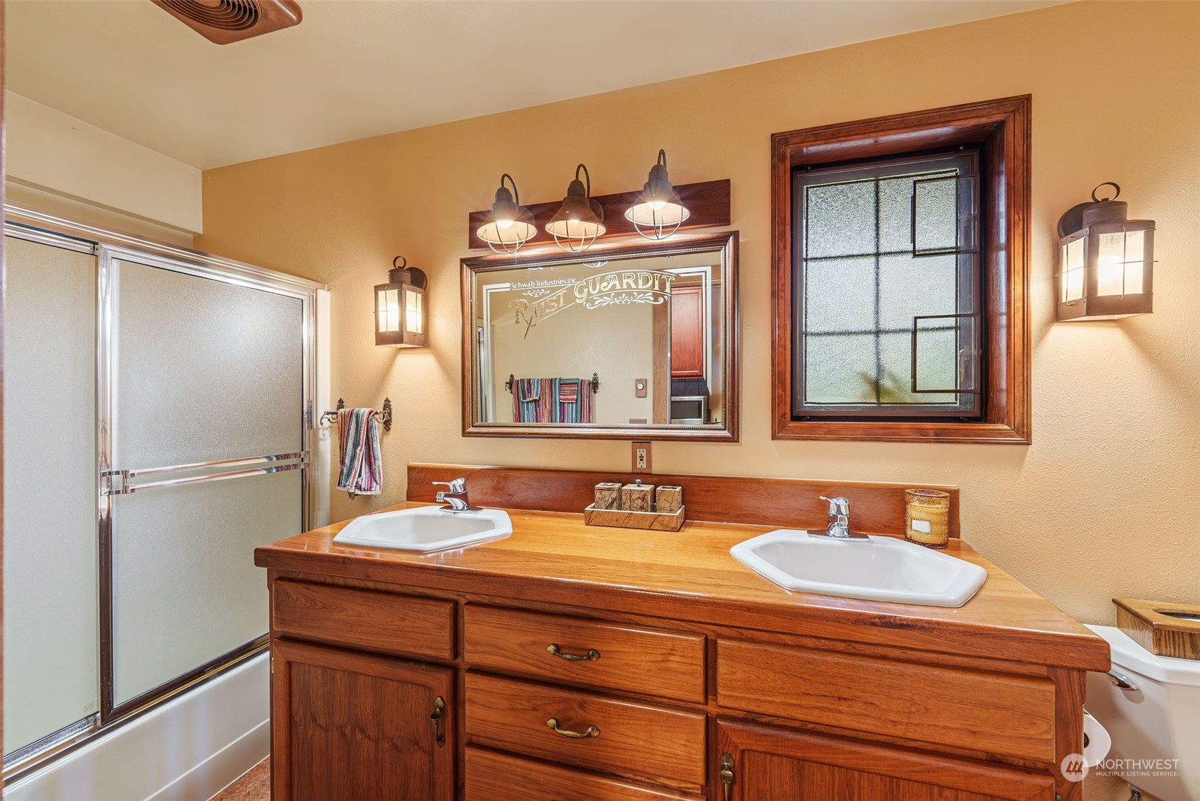 2325 Cays Road Sequim, WA 98382 - Photo 27 of 36 a bathroom with a sink double vanity and a mirror