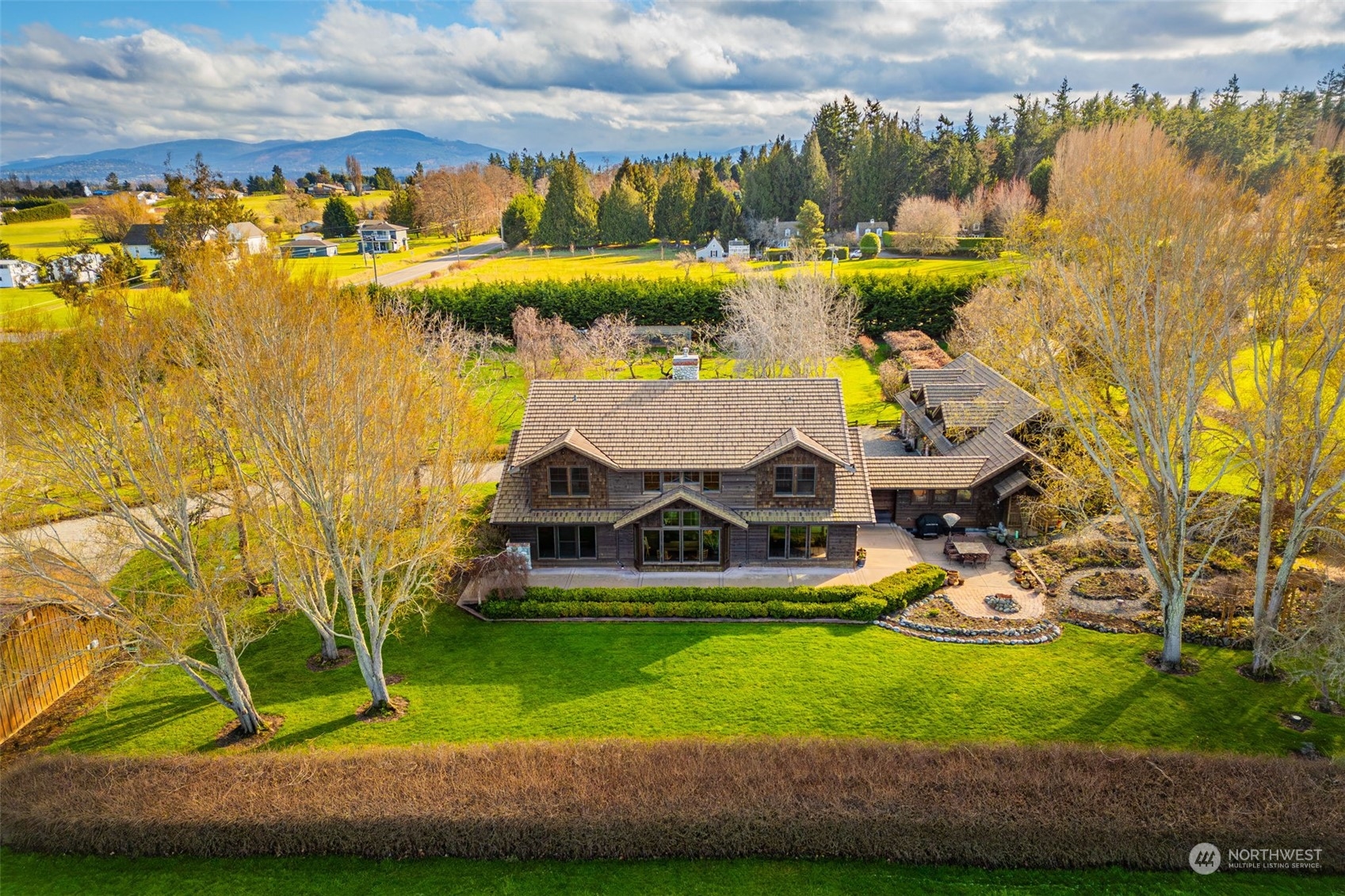 2325 Cays Road Sequim, WA 98382 - Photo 3 of 36 an aerial view of a house with a yard basket ball court and outdoor seating