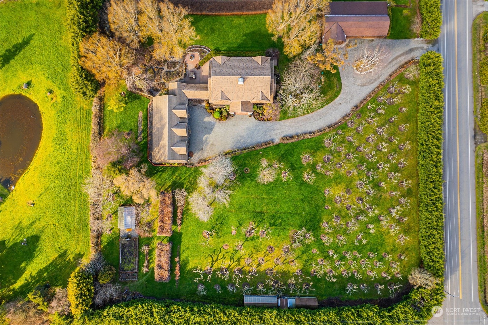 2325 Cays Road Sequim, WA 98382 - Photo 32 of 36 an aerial view of a house with swimming pool and garden