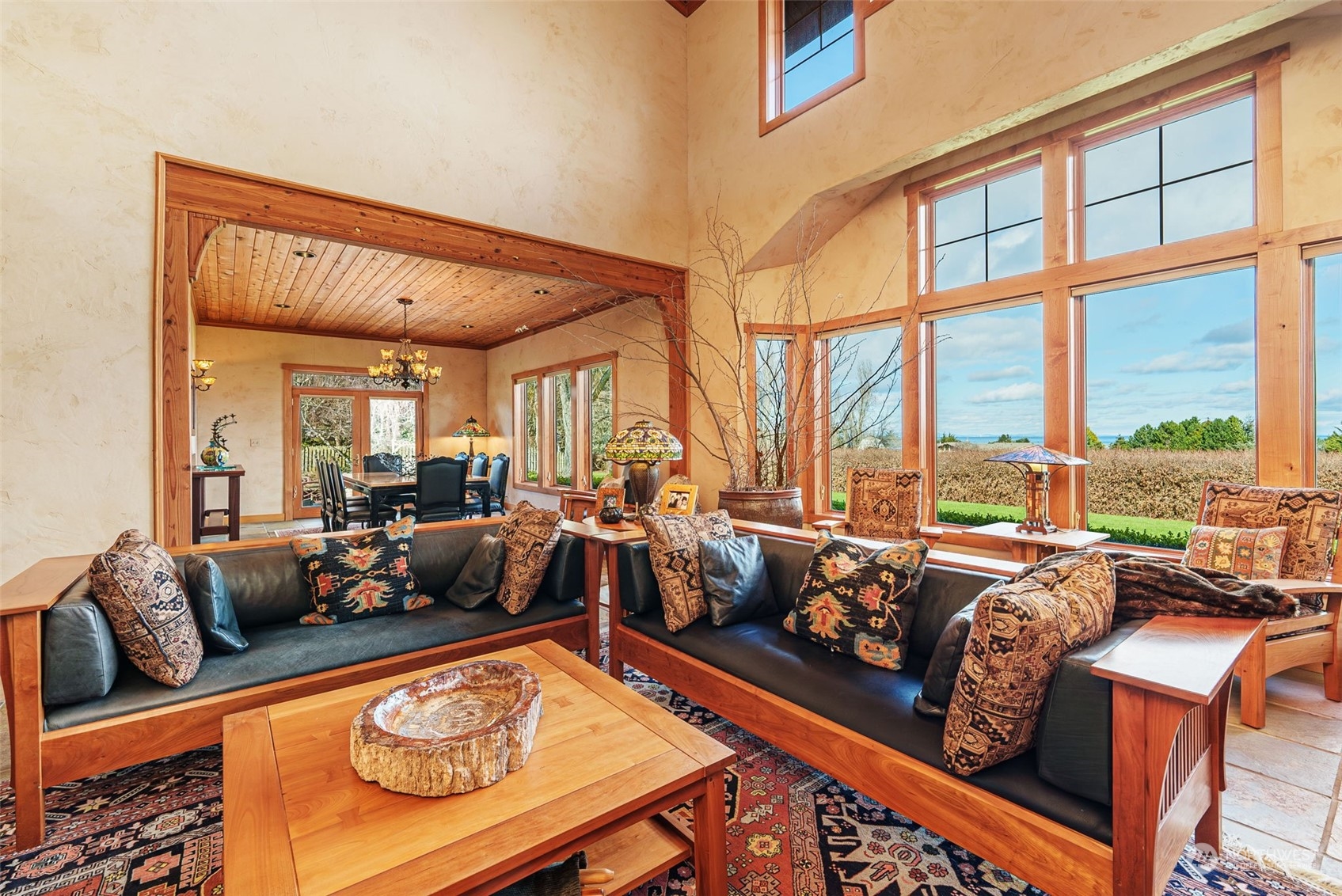 2325 Cays Road Sequim, WA 98382 - Photo 7 of 36 a living room with furniture fireplace and large windows