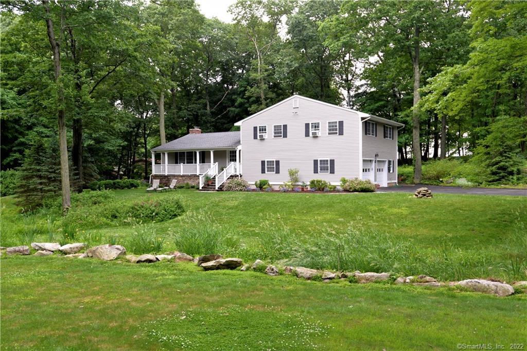 338 Barrack Hill Road Ridgefield, CT 06877 - Photo 1 of 1 a view of a house with a yard