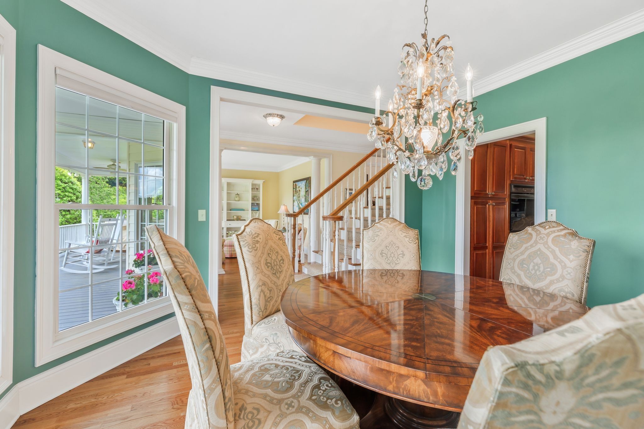 1036 Reed Hollow Road Readyville, TN 37149 - Photo 13 of 90 a view of a dining room with furniture and chandelier