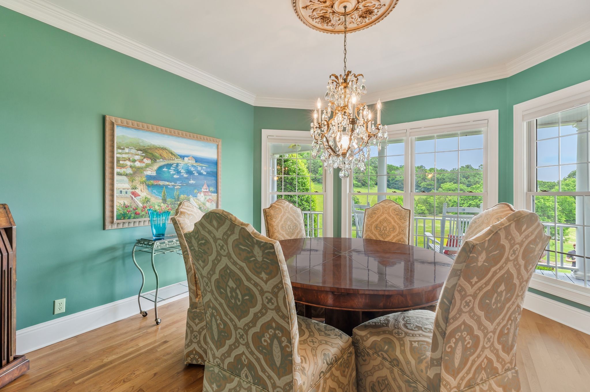 1036 Reed Hollow Road Readyville, TN 37149 - Photo 14 of 90 a view of a dining room with furniture a chandelier and wooden floor