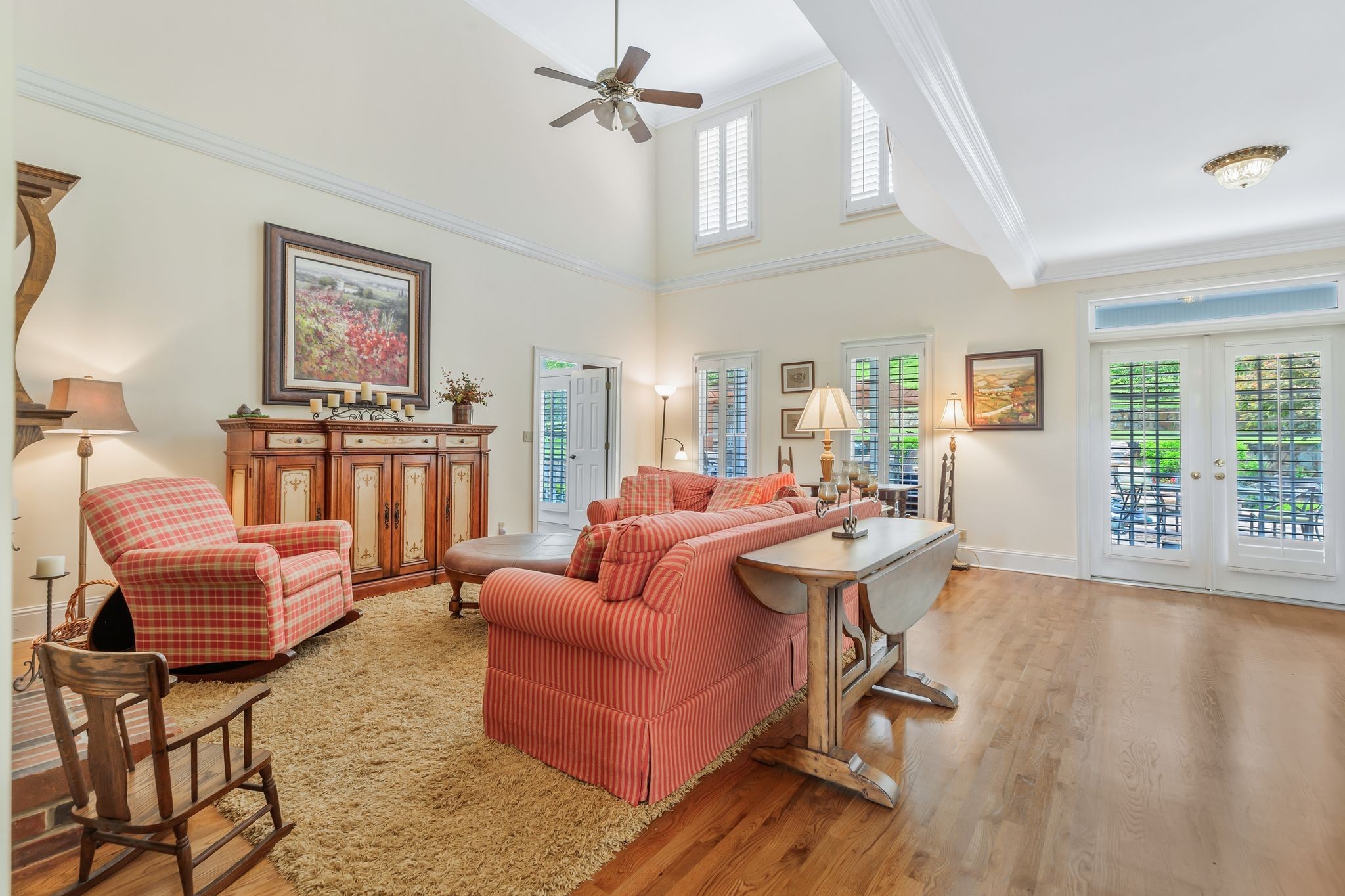 1036 Reed Hollow Road Readyville, TN 37149 - Photo 17 of 90 a living room with furniture a flat screen tv and a large window