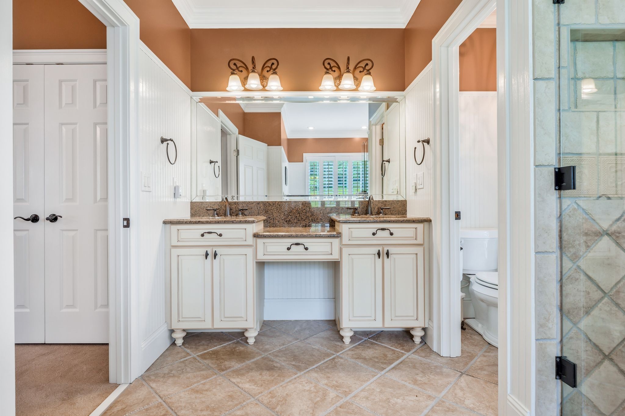 1036 Reed Hollow Road Readyville, TN 37149 - Photo 37 of 90 a room with white cabinets and clock on the wall