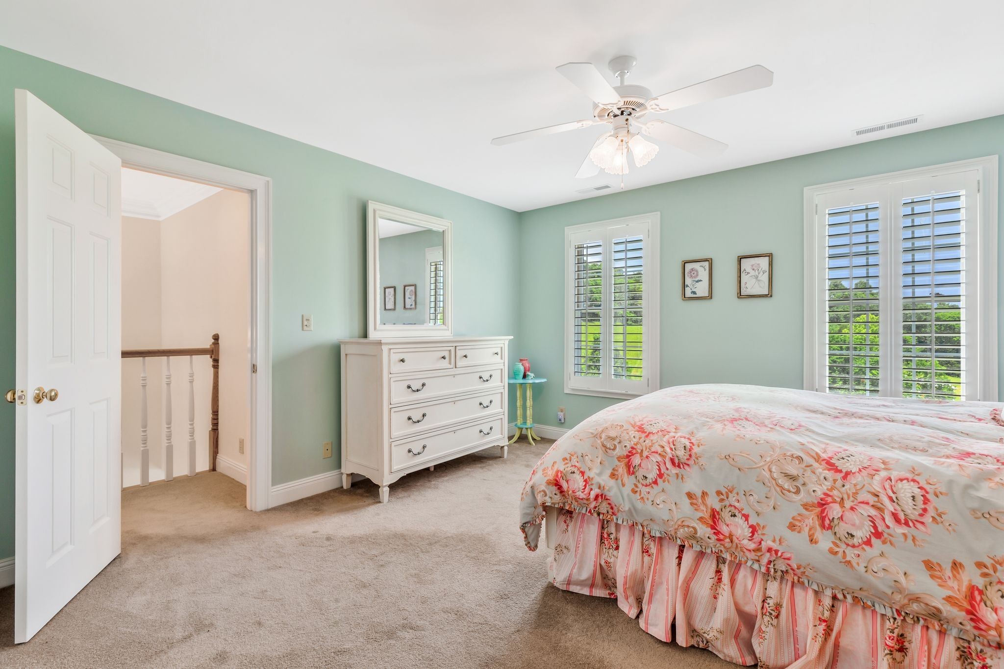 1036 Reed Hollow Road Readyville, TN 37149 - Photo 42 of 90 a bedroom with a bed and a chandelier