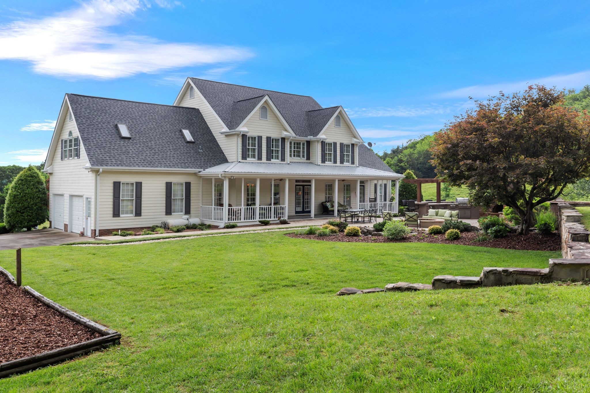 1036 Reed Hollow Road Readyville, TN 37149 - Photo 51 of 90 a front view of a house with a garden