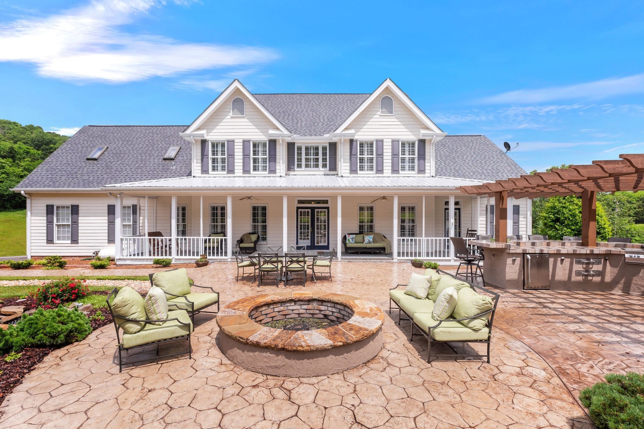 1036 Reed Hollow Road Readyville, TN 37149 - Photo 52 of 90 a view of a house with swimming pool and sitting area