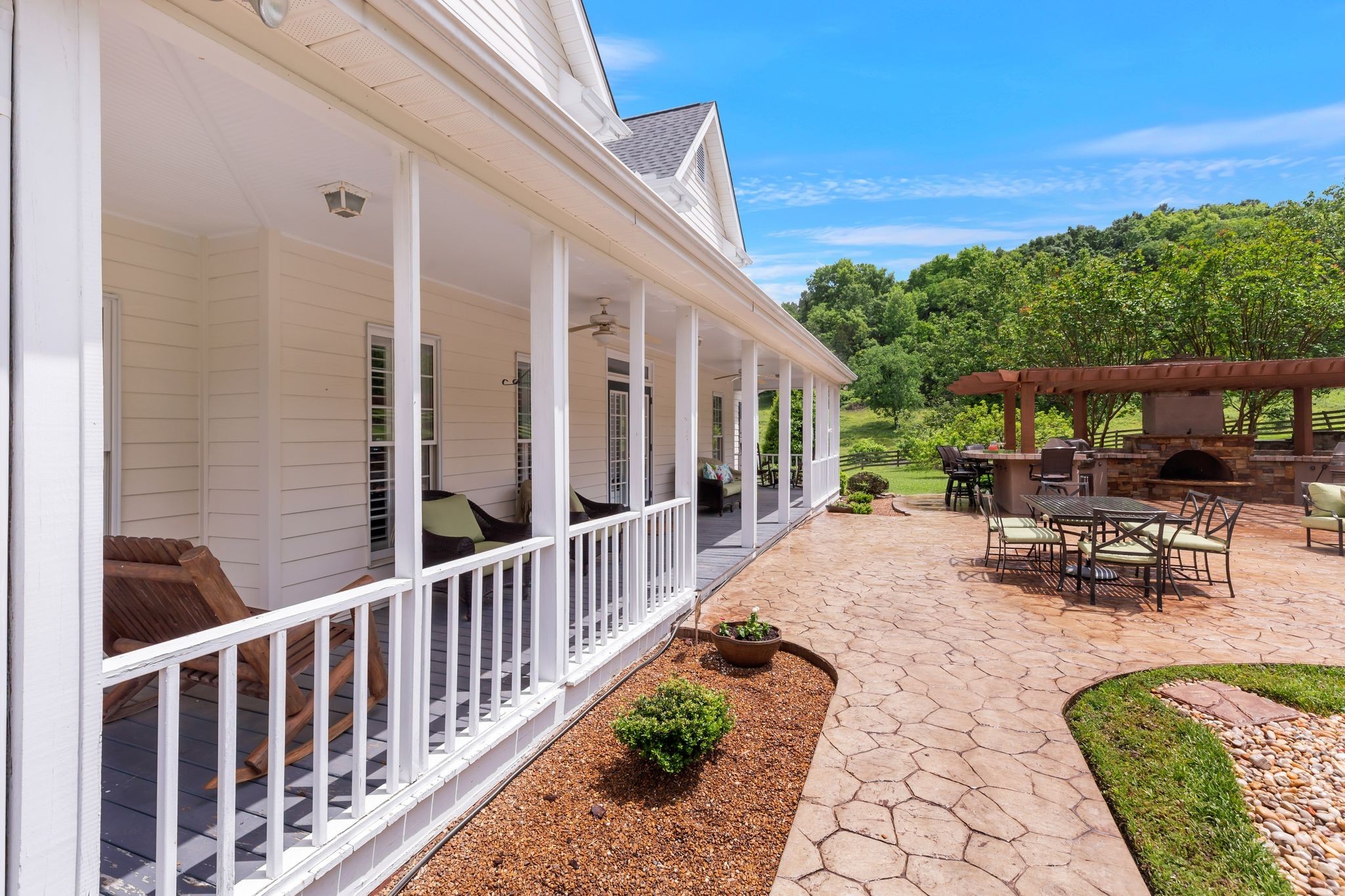 1036 Reed Hollow Road Readyville, TN 37149 - Photo 53 of 90 a view of a patio with chairs and table in patio