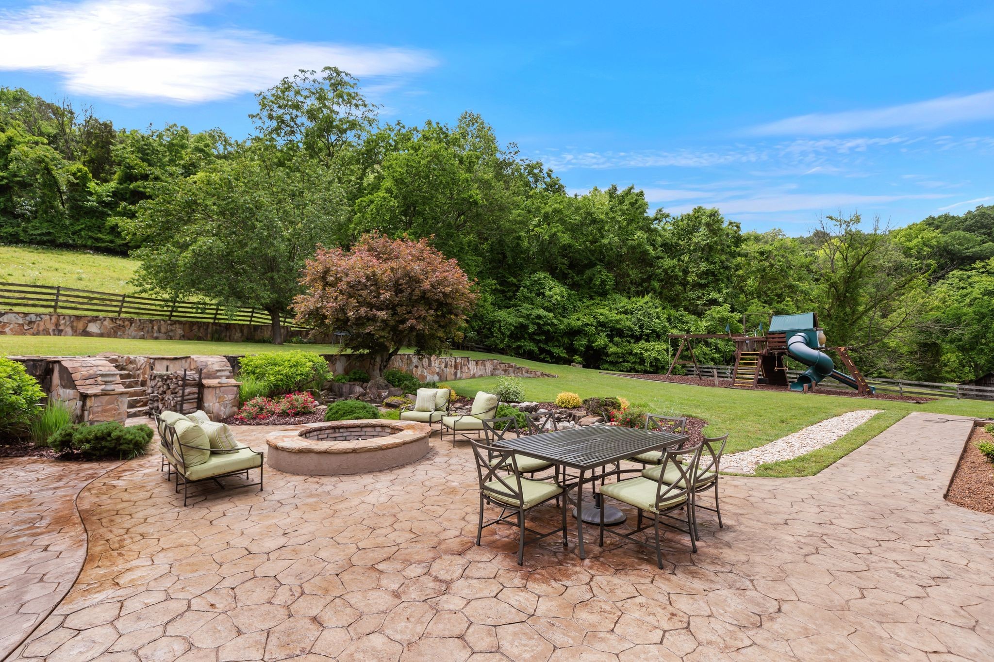 1036 Reed Hollow Road Readyville, TN 37149 - Photo 59 of 90 a view of a backyard with sitting area