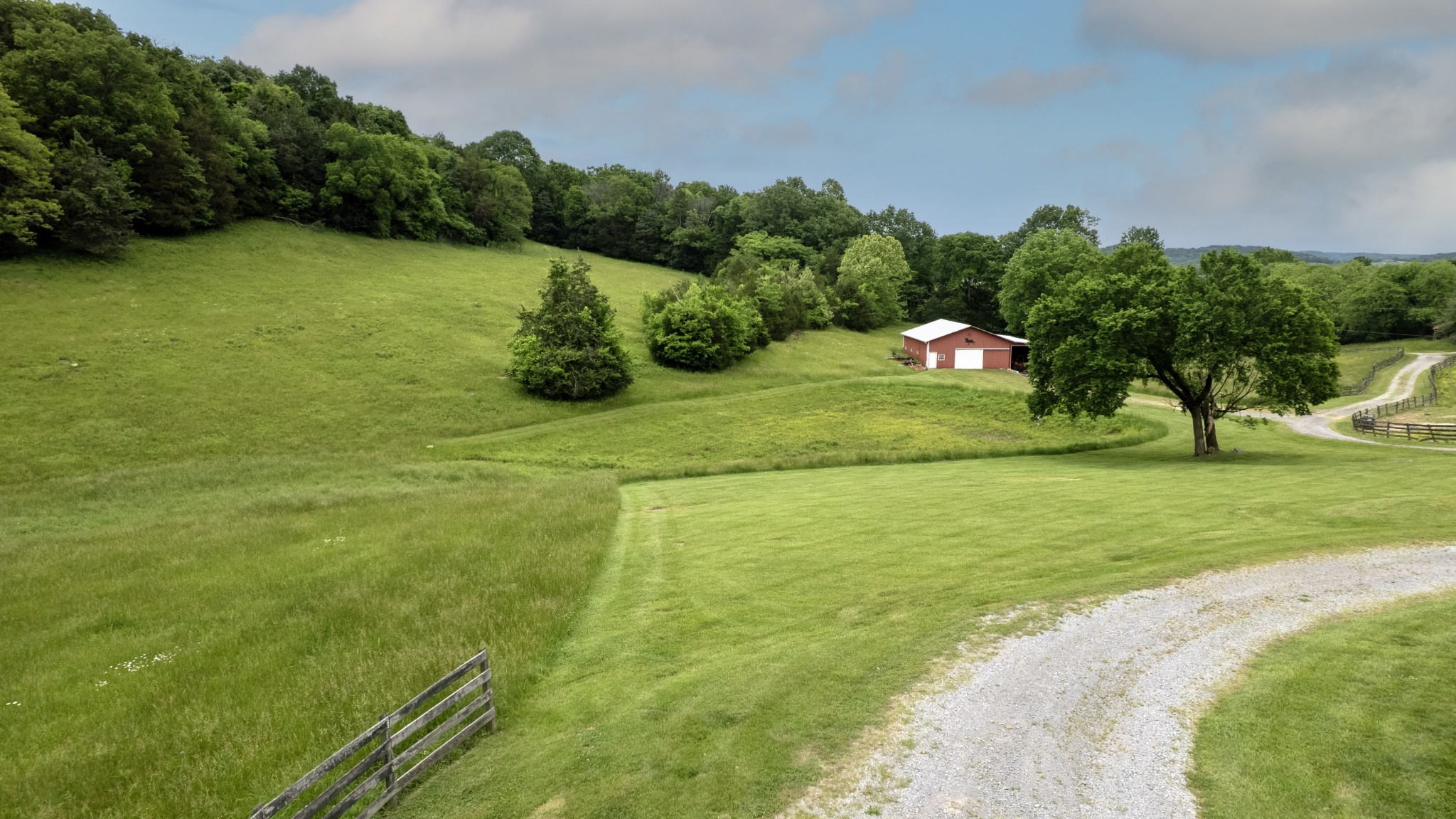 1036 Reed Hollow Road Readyville, TN 37149 - Photo 72 of 90 a view of a golf course with a lake