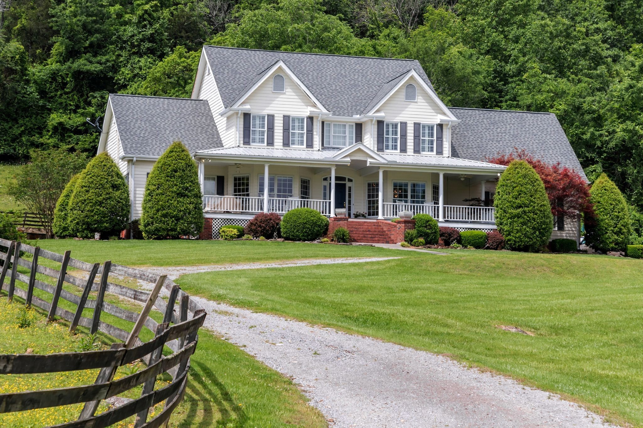 1036 Reed Hollow Road Readyville, TN 37149 - Photo 8 of 90 a view of a house with a yard and sitting area