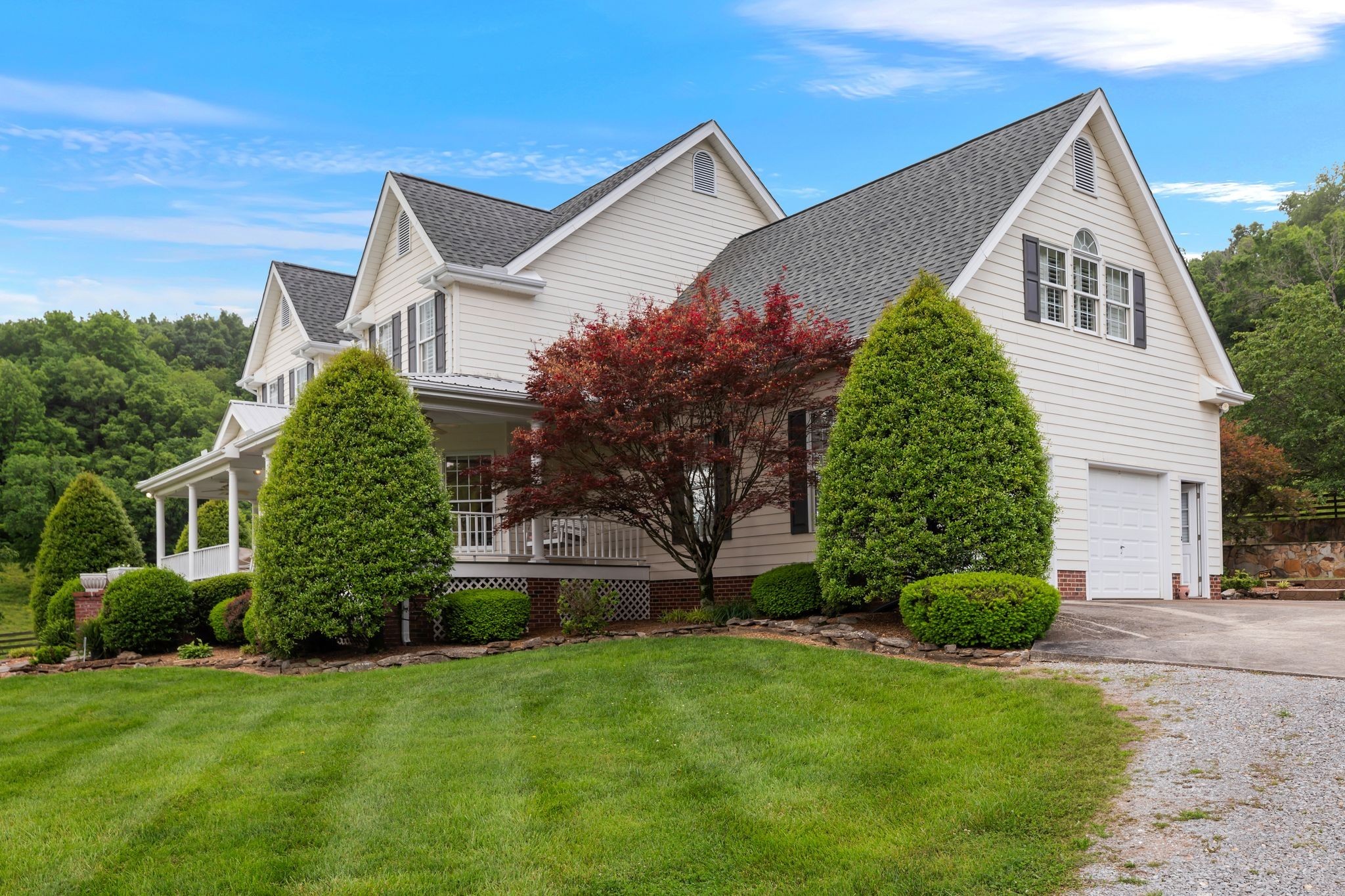 1036 Reed Hollow Road Readyville, TN 37149 - Photo 9 of 90 a front view of a house with a garden