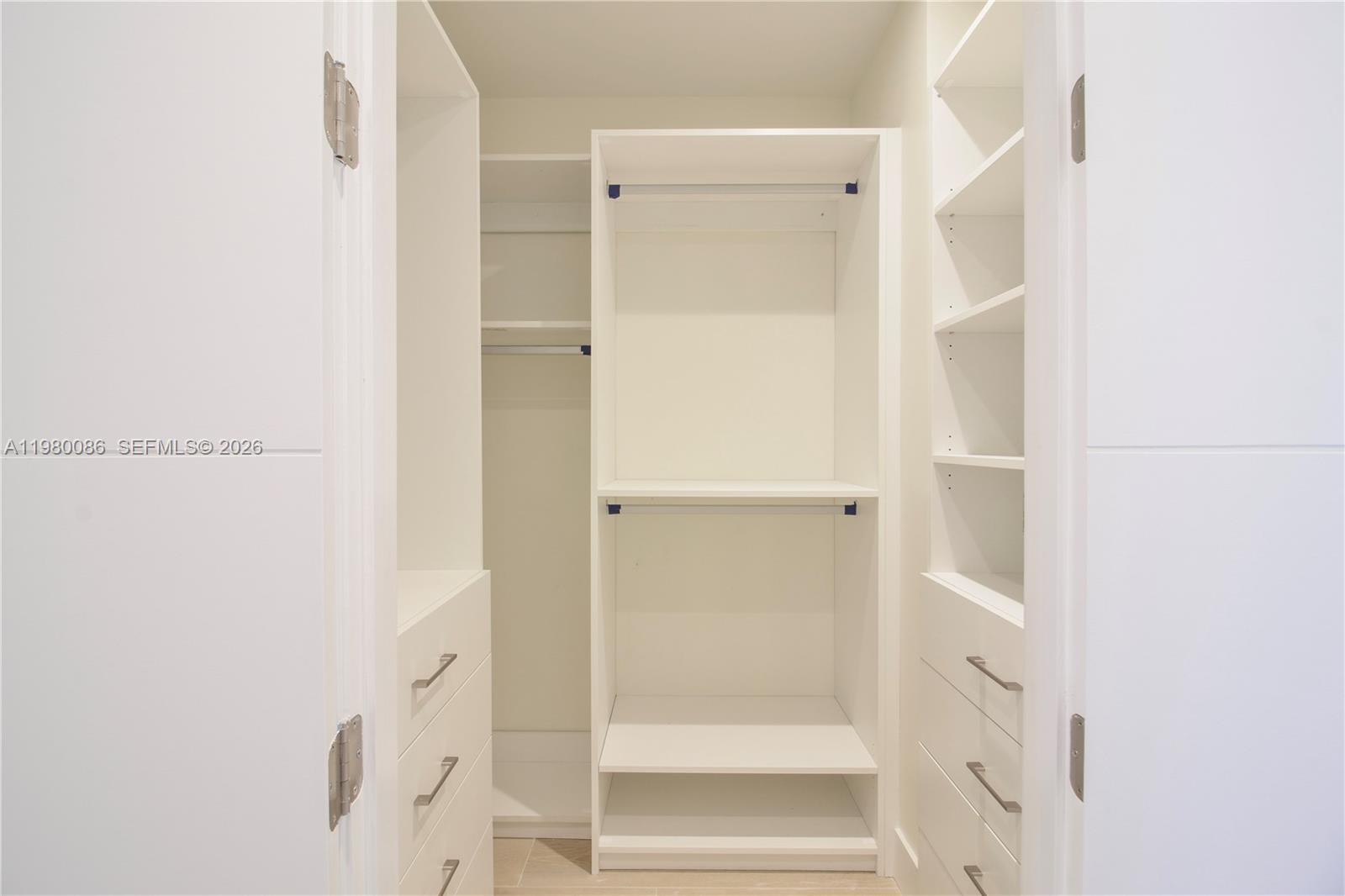 151 Crandon Boulevard, Unit 540 Key Biscayne, FL 33149 - Photo 37 of 41 a bathroom with a glass shower door