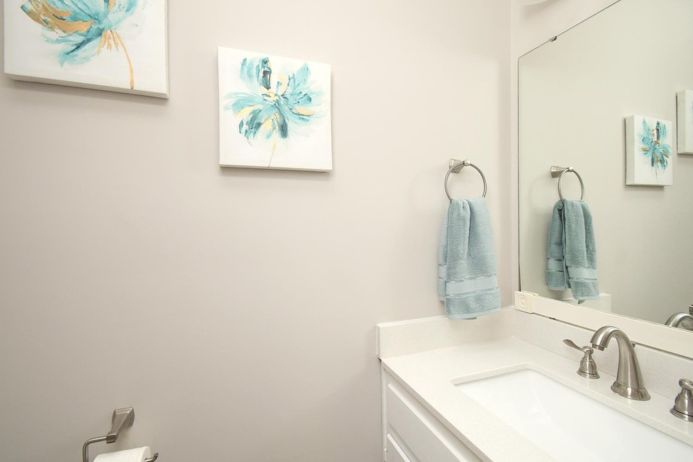 5903 Sentinel Drive Raleigh, NC 27609 - Photo 16 of 26 Half Bath on main level off of the Foyer. Half Hall Bathoom