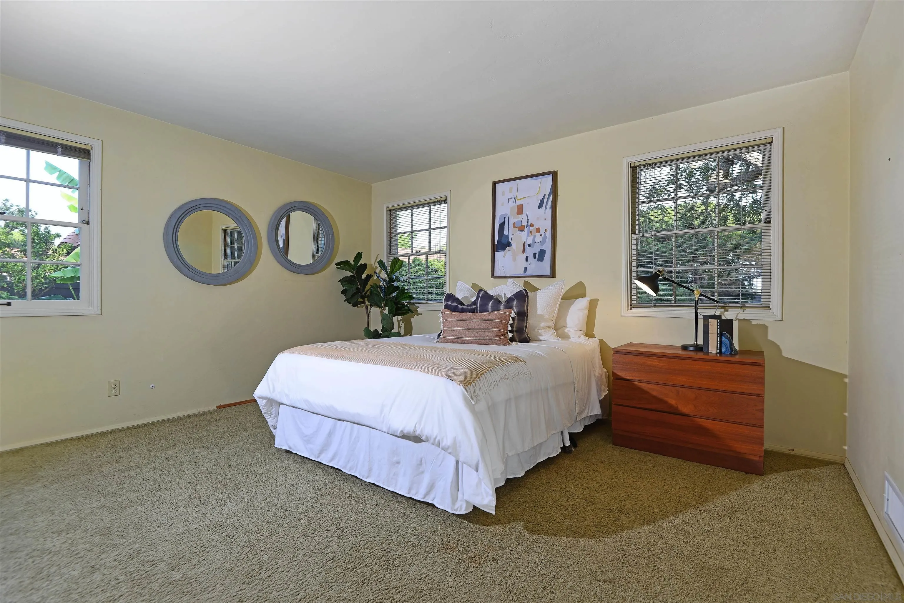 1780 La Jolla Rancho Road La Jolla, CA 92037 - Photo 15 of 24 a bed room with a bed and a window