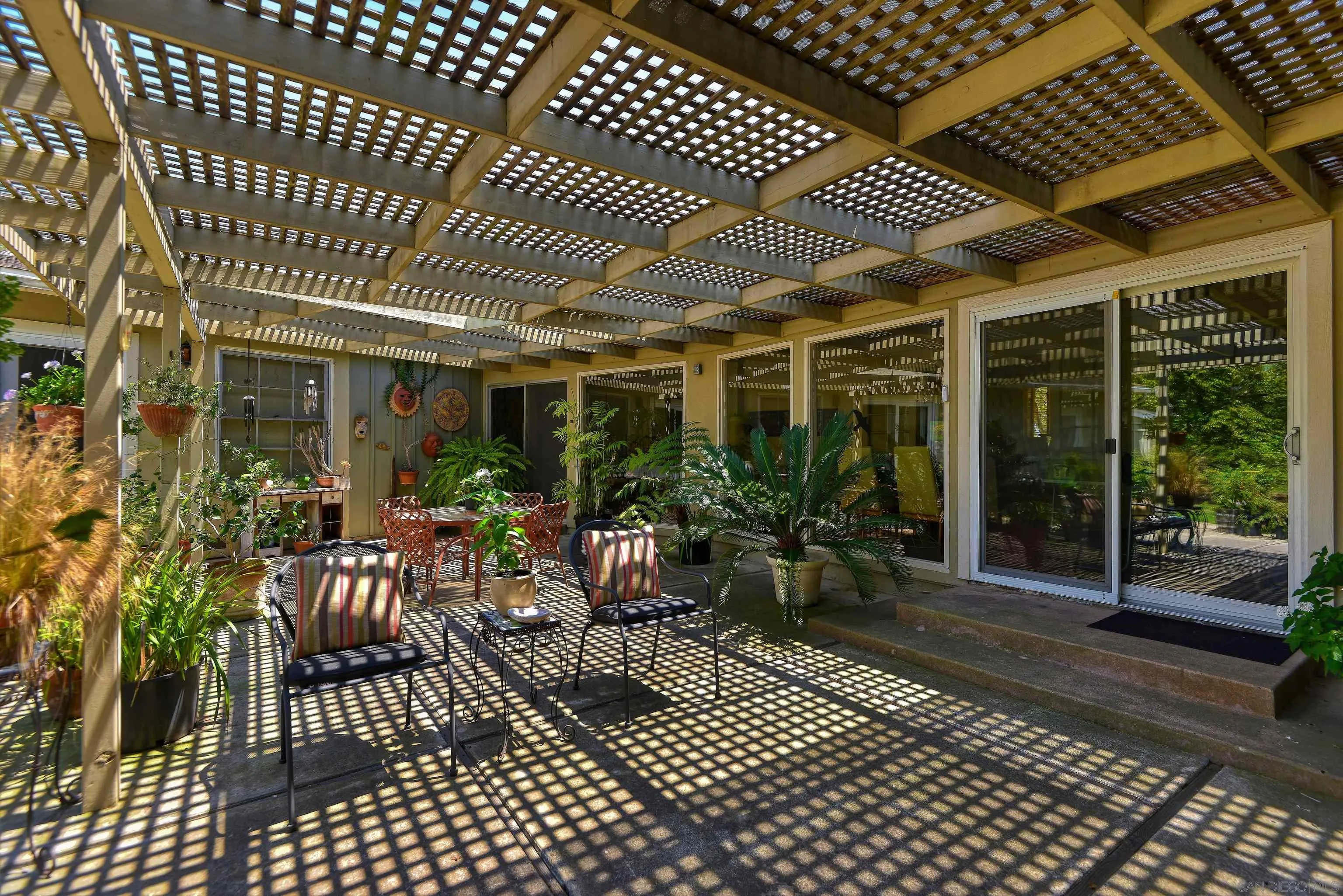 1780 La Jolla Rancho Road La Jolla, CA 92037 - Photo 16 of 24 a view of a porch with chairs
