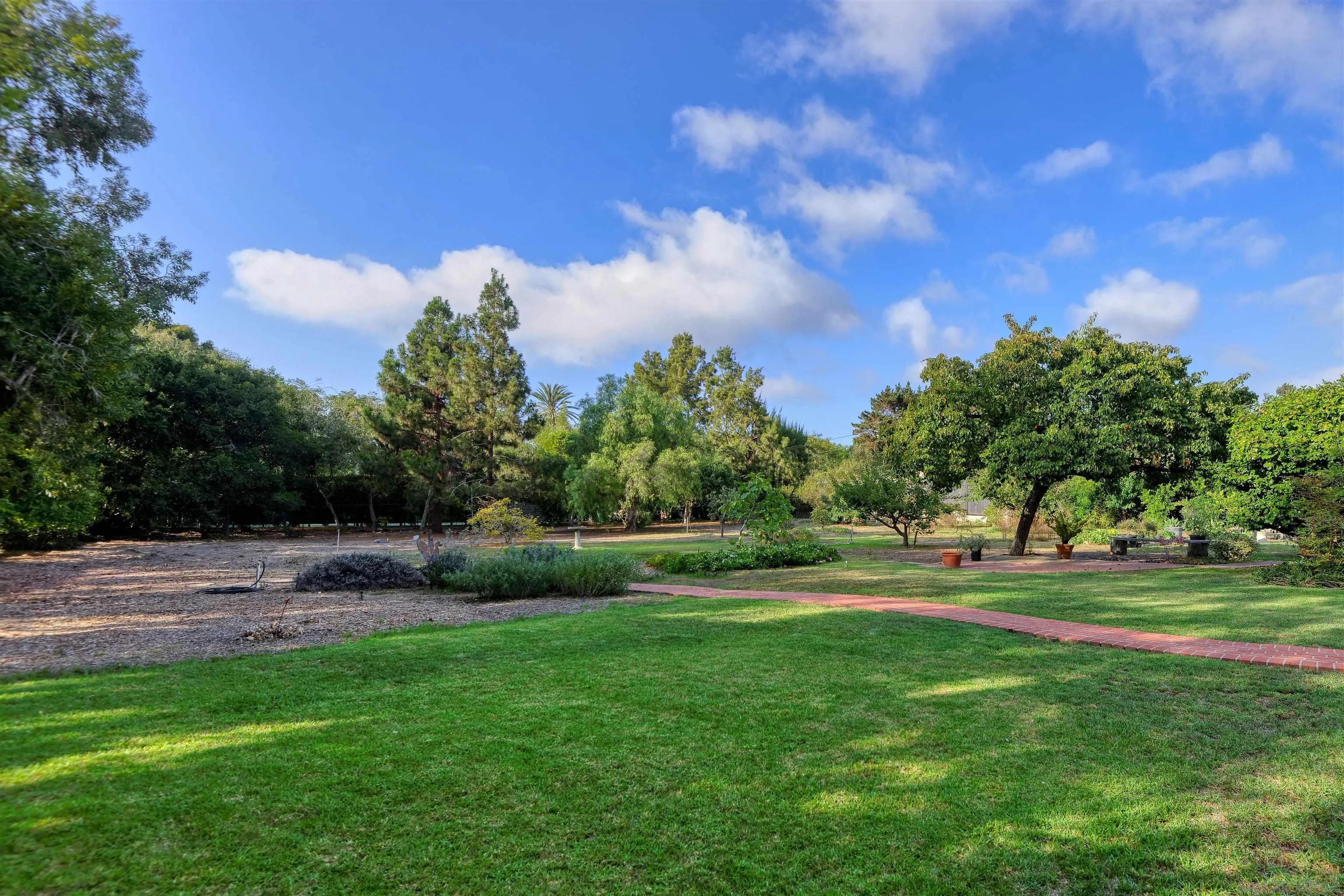 1780 La Jolla Rancho Road La Jolla, CA 92037 - Photo 21 of 24 a view of grassy field with trees