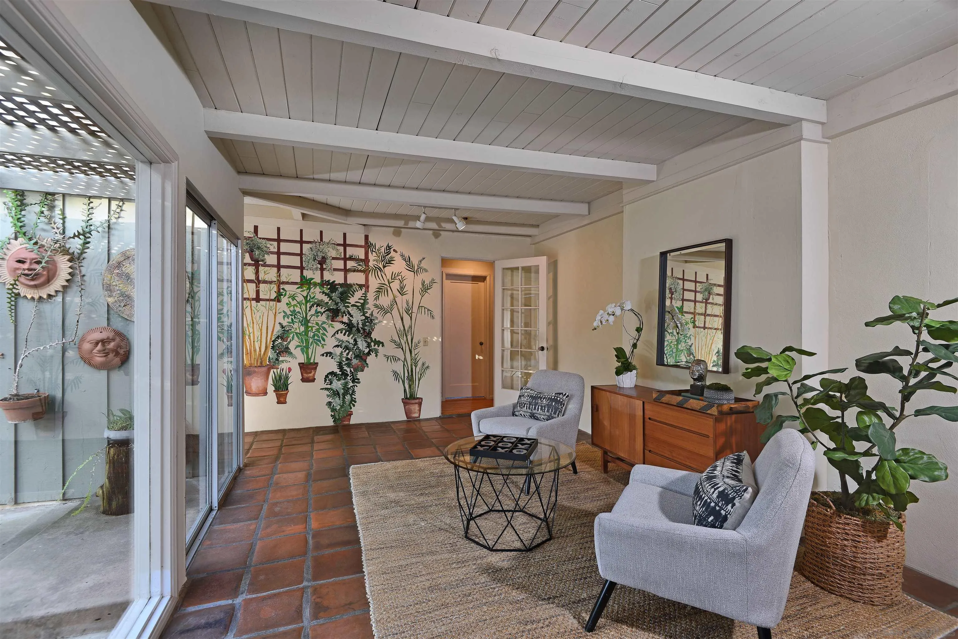 1780 La Jolla Rancho Road La Jolla, CA 92037 - Photo 10 of 24 a living room with furniture and a potted plant
