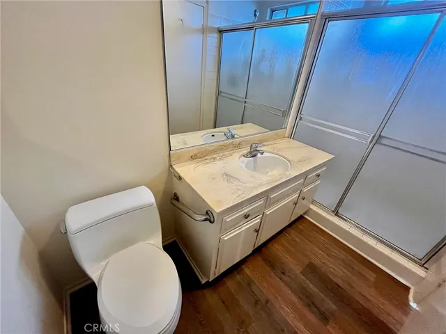 a view of a livingroom with wooden floor