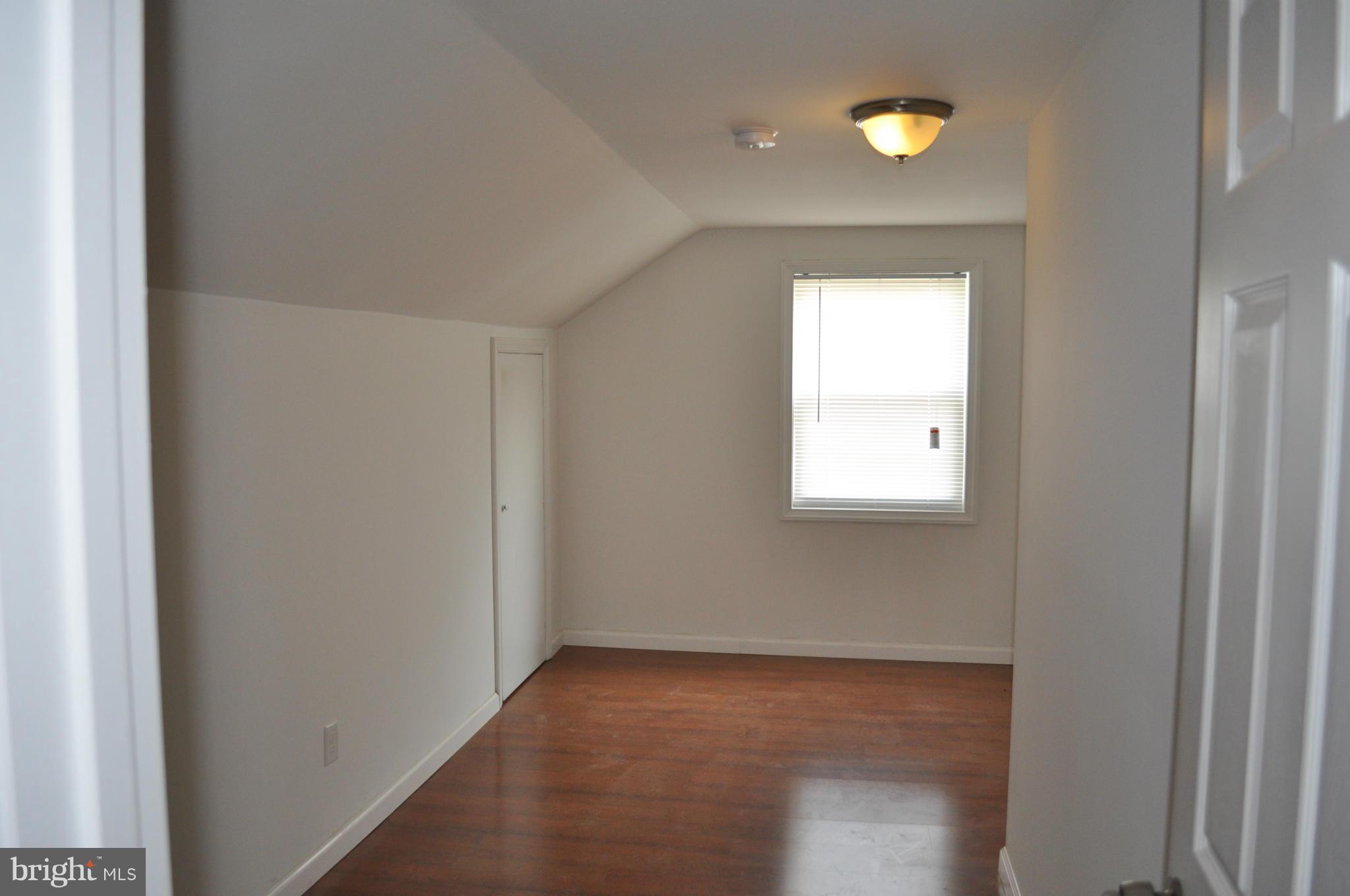 1108 Navahoe Drive Silver Spring, MD 20903 - Photo 13 of 14 a view of an empty room with a window