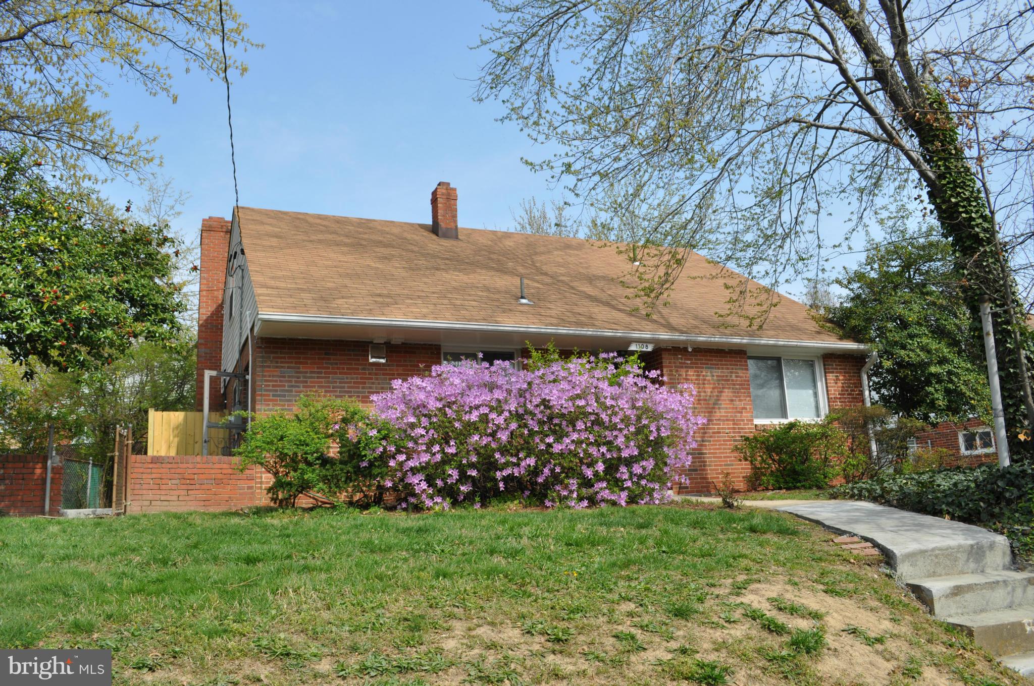 1108 Navahoe Drive Silver Spring, MD 20903 - Photo 2 of 14 a view of a house with a yard
