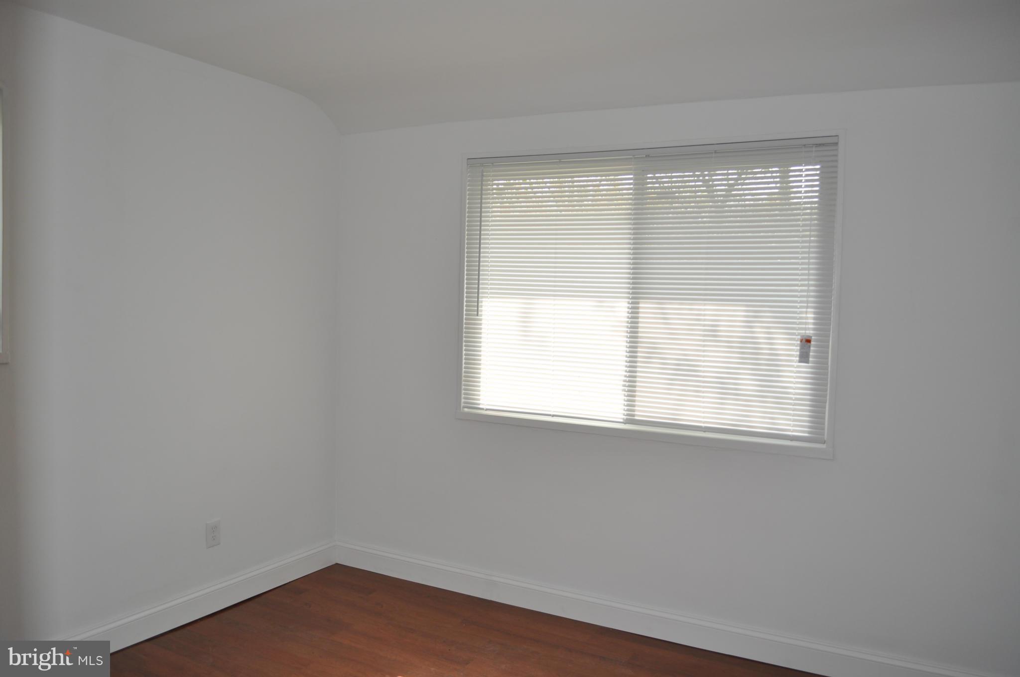 1108 Navahoe Drive Silver Spring, MD 20903 - Photo 8 of 14 an empty room with a window