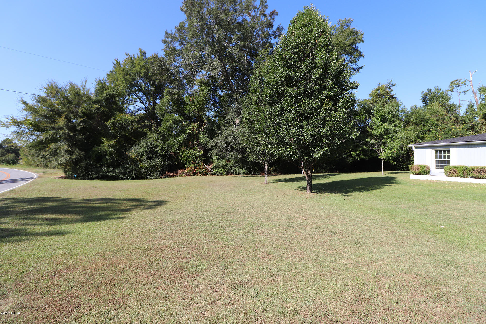 6669 Goodall Mill Road Macon, GA 31216 - Photo 2 of 28 a view of a house with a yard