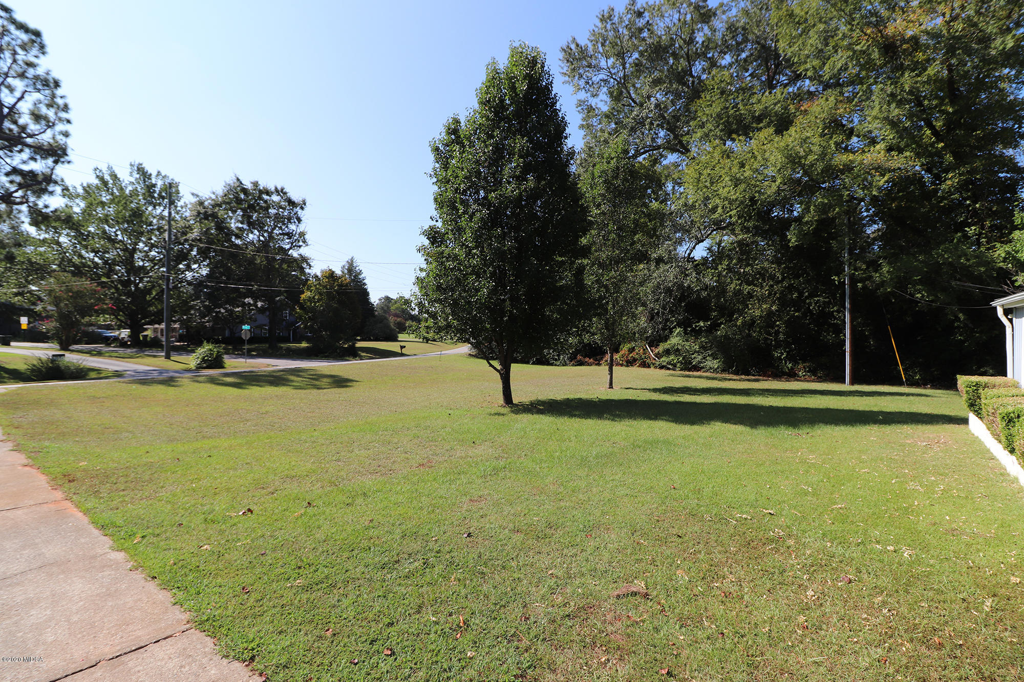 6669 Goodall Mill Road Macon, GA 31216 - Photo 3 of 28 a view of a swimming pool with a yard