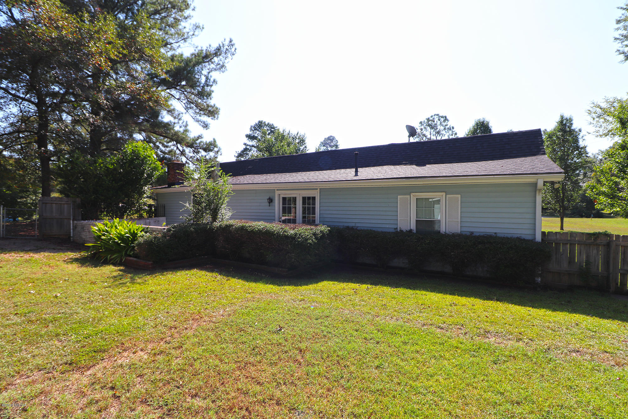 6669 Goodall Mill Road Macon, GA 31216 - Photo 26 of 28 a view of house with yard and swimming pool