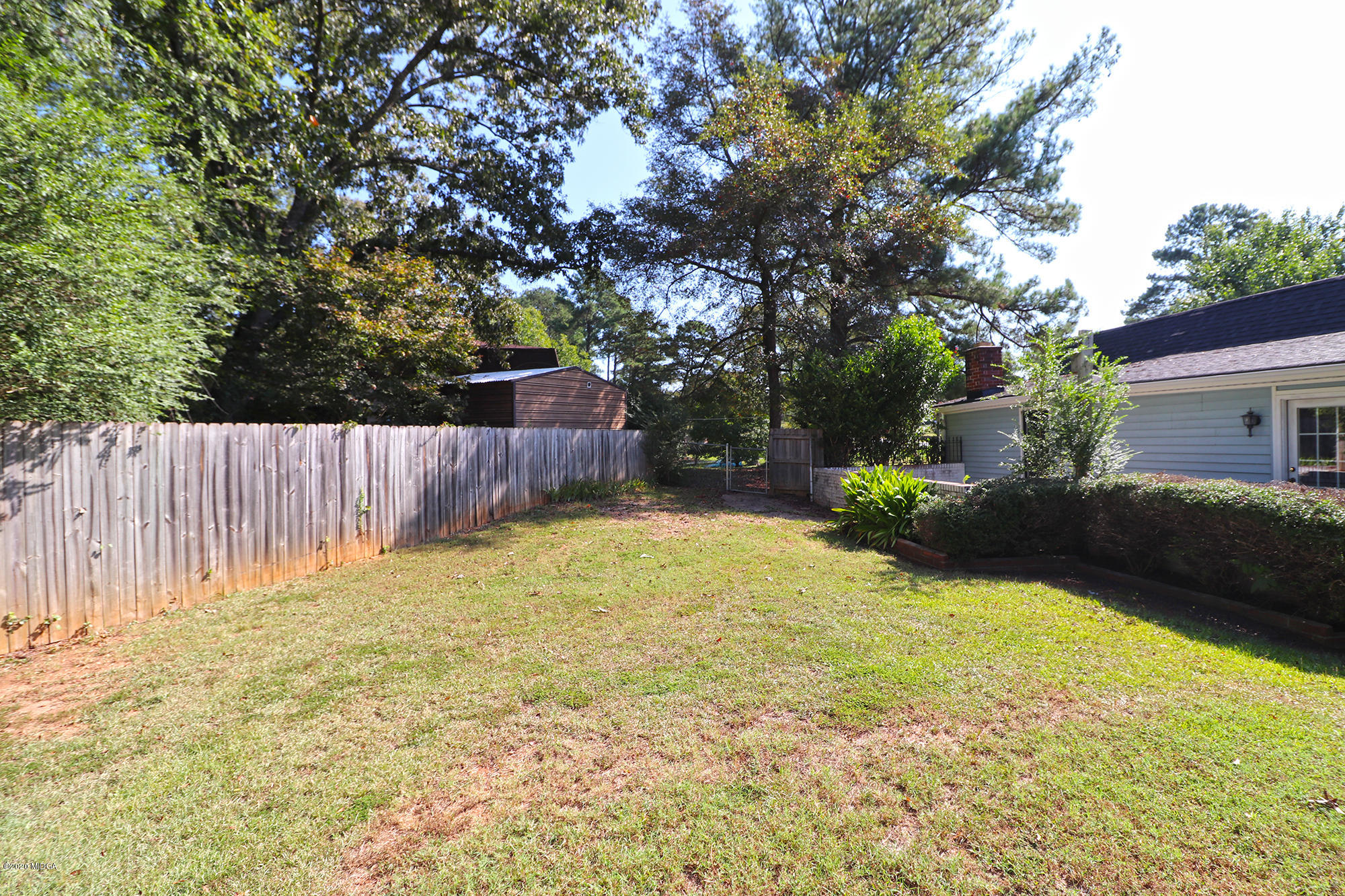 6669 Goodall Mill Road Macon, GA 31216 - Photo 27 of 28 a backyard of a house